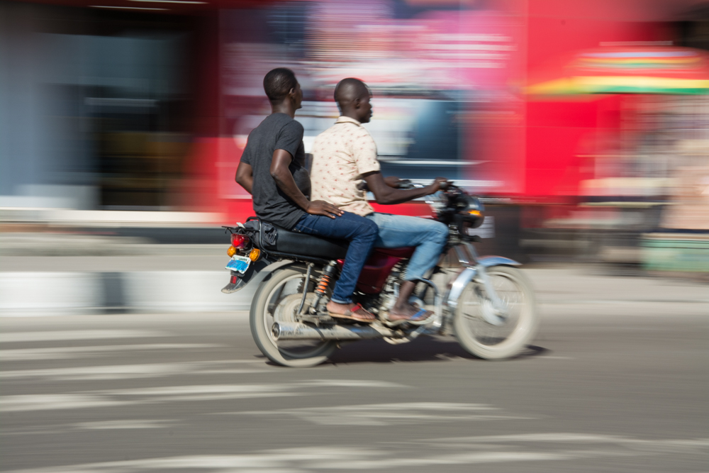 A Nigerian driver earning income on the road